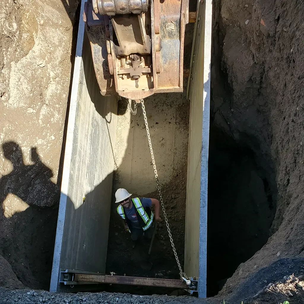 shoring up a hole to make sure the guys are safe