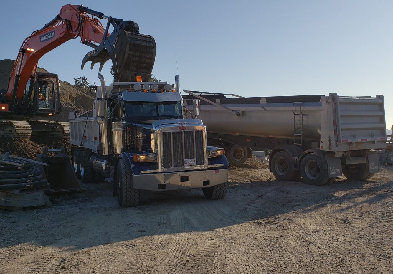 Finish Line truck and tri being filled at the site